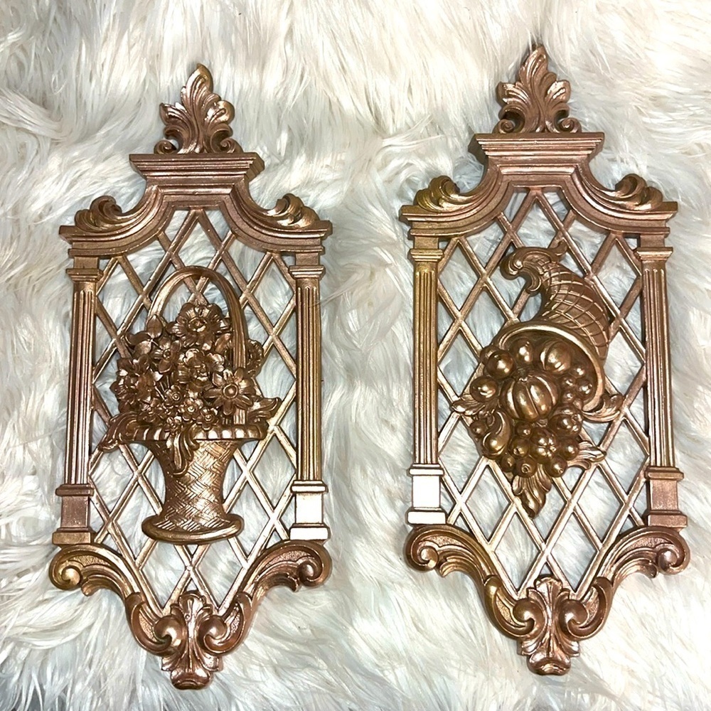 Set of 2 HOMCO gold wall plaques. Seasons spring and fall. Painted gold.